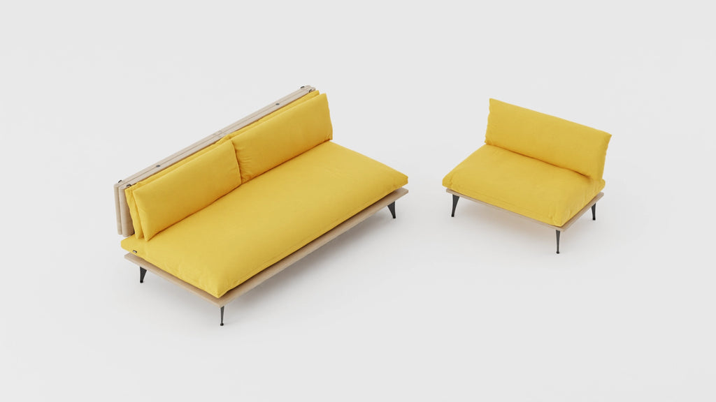 Five in one transformable sectional sofa with ottoman transformed in armchair. Sofa and armchair in yellow mustard color. View at an angle. 