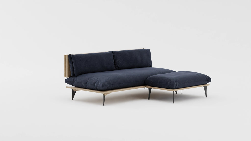 Five in one transformable sectional sofa with ottoman in deep dark blue. VIew at an angle.