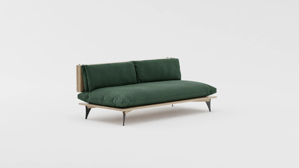 Space saving furniture - Transformable sofa and daybed. Sofa for small space. Transformable sofa in forest royal green color. Modern scandinavian sofa for small space. View at an angle.