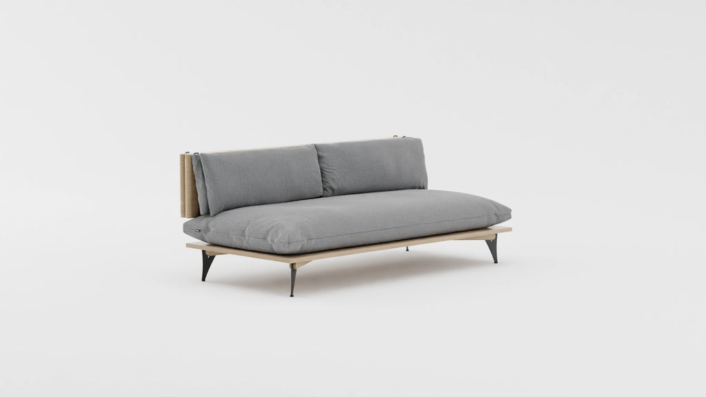 Space saving furniture - Transformable sofa and daybed. Sofa for small space. Transformable sofa in light grey color. Modern scandinavian sofa for small space. View at an angle.